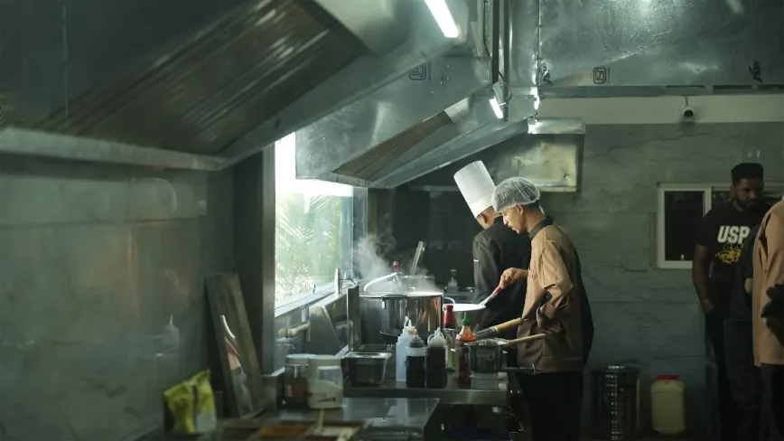 Chefs cooking in the Trijal live kitchen
