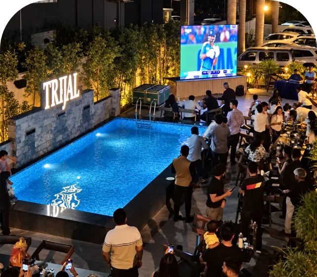 Guests at the Trijal poolside during a special evening